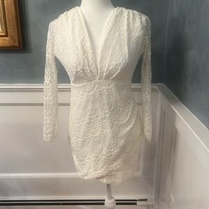 Gorgeous long sleeved white lace Pookie and Sebastian mini dress with tags.